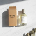 Santal 33 Le Labo - Flat lay en mármol blanco
